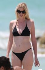 LARA STONE in Bikini on the Set of a Photoshoot in Miami Beach 04/29/2016