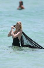 LARA STONE in Bikini on the Set of a Photoshoot in Miami Beach 04/29/2016