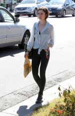 LILY COLLINS Out Shopping in Los Angeles 04/23/2016