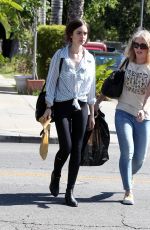 LILY COLLINS Out Shopping in Los Angeles 04/23/2016