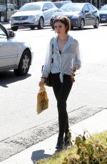 LILY COLLINS Out Shopping in Los Angeles 04/23/2016