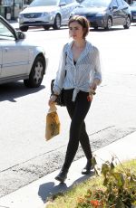 LILY COLLINS Out Shopping in Los Angeles 04/23/2016