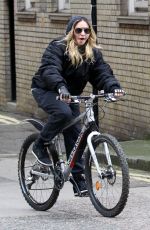 MADONNA Riding a Bike Out in London 04/18/2016