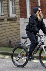 MADONNA Riding a Bike Out in London 04/18/2016