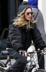 MADONNA Riding a Bike Out in London 04/18/2016