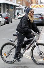 MADONNA Riding a Bike Out in London 04/18/2016