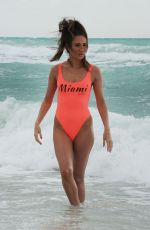 MEGAN MCKENNA in Swimsuit at a Beach un Miami 04/19/2016