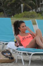 MEGAN MCKENNA in Swimsuit at a Beach un Miami 04/19/2016