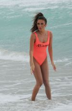 MEGAN MCKENNA in Swimsuit at a Beach un Miami 04/19/2016
