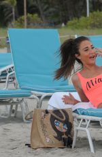 MEGAN MCKENNA in Swimsuit at a Beach un Miami 04/19/2016