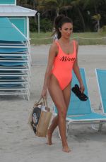 MEGAN MCKENNA in Swimsuit at a Beach un Miami 04/19/2016