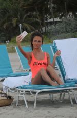 MEGAN MCKENNA in Swimsuit at a Beach un Miami 04/19/2016