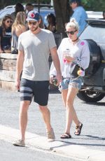 MILEY CYRUS in Denim Shorts Out in Byron Bay 04/29/2016