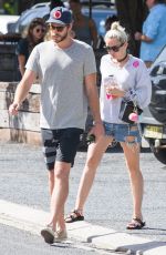 MILEY CYRUS in Denim Shorts Out in Byron Bay 04/29/2016