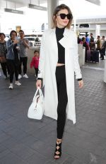 MIRANDA KERR at LAX Airport in Los Angeles 04/11/2016