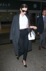 MIRANDA KERR at LAX Airport in Los Angeles 04/13/2016