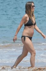 OLIVIA WILDE in Bikini at a Beach in Hawaii 04/22/2016