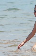 OLIVIA WILDE in Bikini at a Beach in Hawaii 04/22/2016