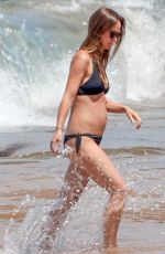 OLIVIA WILDE in Bikini at a Beach in Hawaii 04/22/2016