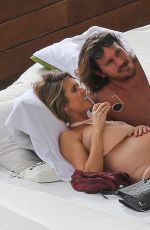 Pregnant AUDRINA PATRIDGE in Bikini at a Pool in Honolulu 04/13/2016