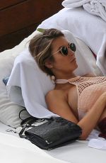 Pregnant AUDRINA PATRIDGE in Bikini at a Pool in Honolulu 04/13/2016
