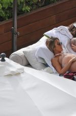 Pregnant AUDRINA PATRIDGE in Bikini at a Pool in Honolulu 04/13/2016