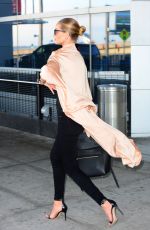 ROSIE HUNTINGTON-WHITELEY at JFK Airport in New York 04/27/2016