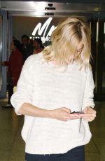 SIENNA MILLER at Heathrow Airport in London 04/22/2016