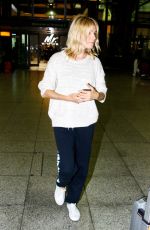 SIENNA MILLER at Heathrow Airport in London 04/22/2016