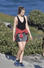 BRIDGET MALCOM Out Walking on Bondi Beach 05/24/2016