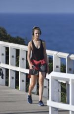 BRIDGET MALCOM Out Walking on Bondi Beach 05/24/2016