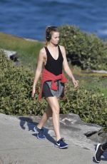 BRIDGET MALCOM Out Walking on Bondi Beach 05/24/2016