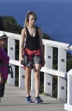 BRIDGET MALCOM Out Walking on Bondi Beach 05/24/2016