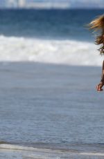 CHARLOTTE MCKINNEY in Bikini at a Beach in Malibu 05/08/2016