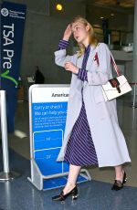 ELLE FANNING at LAX Airport in Los Angeles 05/29/2016