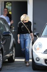 EMMA STONE in Ripped Jeans Out in Beverly Hills 05/21/2016
