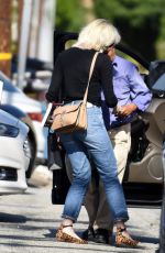 EMMA STONE in Ripped Jeans Out in Beverly Hills 05/21/2016
