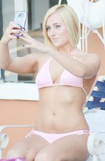 KATE ENGLAND in Bikini at a Pool in Miami 05/01/2016