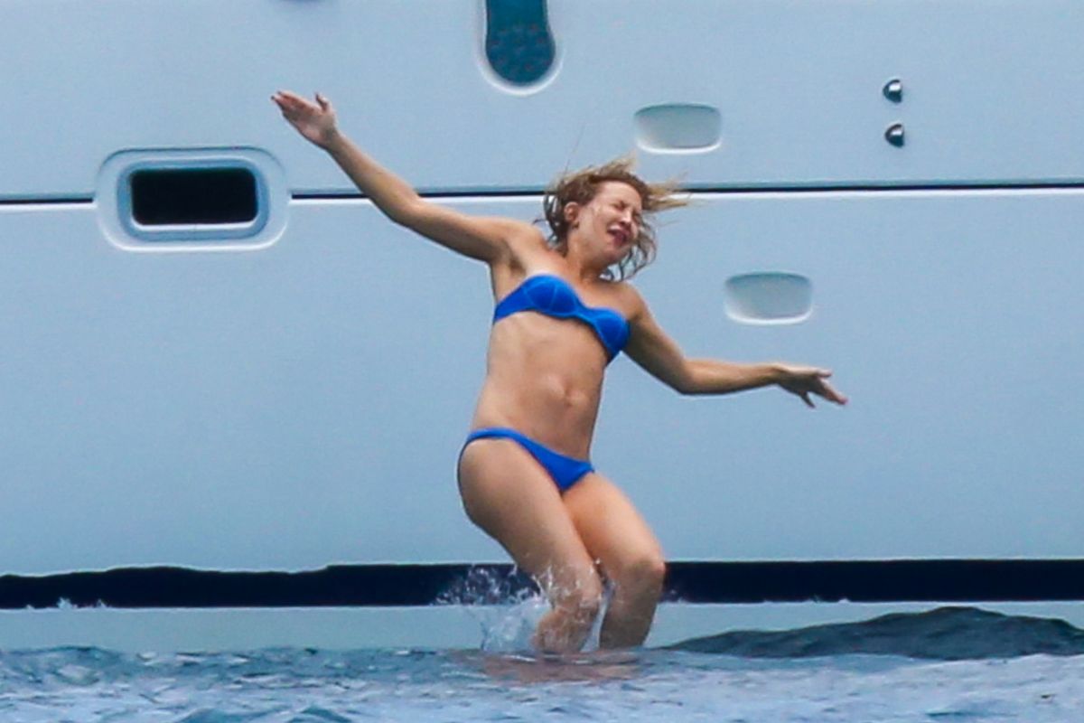 KATE HUDSON in Bikini at a Yacht in Hawaii 05/29/2016.
