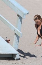 KELLY ROHRBACH in Swimsuit on the Set of a Photoshoot in Malibu 05/23/2016