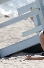 KELLY ROHRBACH in Swimsuit on the Set of a Photoshoot in Malibu 05/23/2016