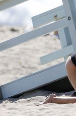 KELLY ROHRBACH in Swimsuit on the Set of a Photoshoot in Malibu 05/23/2016