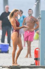 KELLY ROHRBACH in Swimsuit on the Set of 