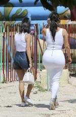 KIM and KOURTNEY KARDASHIAN at a Park in Havana 05/05/2016