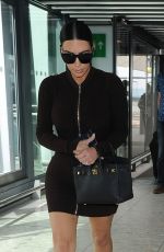 KIM KARDASHIAN and Kanye West at Heathrow Airport in London 05/22/2016