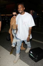 KIM KARDASHIAN and Kanye West at LAX Airport in Los Angeles 05/19/2016