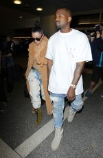 KIM KARDASHIAN and Kanye West at LAX Airport in Los Angeles 05/19/2016