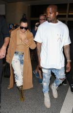 KIM KARDASHIAN and Kanye West at LAX Airport in Los Angeles 05/19/2016