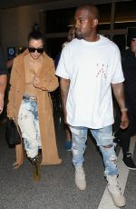 KIM KARDASHIAN and Kanye West at LAX Airport in Los Angeles 05/19/2016