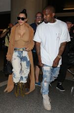 KIM KARDASHIAN and Kanye West at LAX Airport in Los Angeles 05/19/2016